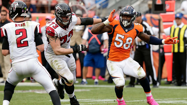 Oct 9, 2016; Denver, CO, USA; Atlanta Falcons quarterback Matt Ryan (2) looks to pass as tackle Ryan Schraeder (73) defends against Denver Broncos outside linebacker Von Miller (58) in the fourth quarter at Sports Authority Field at Mile High. The Falcons won 23-16. Photo Credit: Isaiah J. Downing-USA TODAY Sports