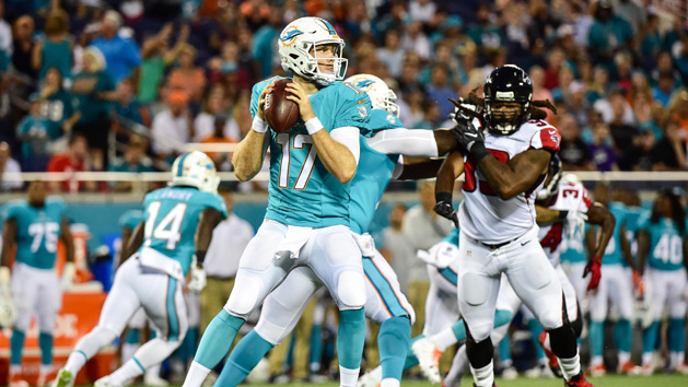 Nov 2, 2014; Miami Gardens, FL, USA; Miami Dolphins quarterback Ryan Tannehill (17) runs with the ball against the San Diego Chargers during the second half at Sun Life Stadium. The Dolphins won 37-0. Photo Credit: Steve Mitchell-USA TODAY Sports