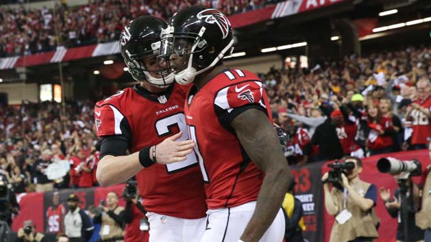 Jan 22, 2017; Atlanta, GA, USA; Atlanta Falcons wide receiver Julio Jones (11) scores a touchdown and is congratulated by quarterback Matt Ryan (2) during the third quarter against the Green Bay Packers in the 2017 NFC Championship Game at the Georgia Dome. Photo Credit: Jason Getz-USA TODAY Sports