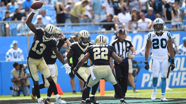 Sep 24, 2017; Charlotte, NC, USA; New Orleans Saints running back Alvin Kamara (41) celebrates with wide receiver Michael Thomas (13), quarterback Drew Brees (9) and running back Mark Ingram (22) after scoring a touchdown in the fourth quarter at Bank of America Stadium. Photo Credit: Bob Donnan-USA TODAY Sports