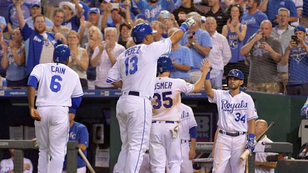 Jun 15, 2016; Kansas City, MO, USA; Kansas City Royals catcher Salvador Perez (13) signals to the fans after hitting a two run home run in the fifth inning against the Cleveland Indians at Kauffman Stadium. Photo Credit: Denny Medley-USA TODAY Sports