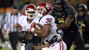 Big 12 Notebook: OU sinks Bears national title hopes