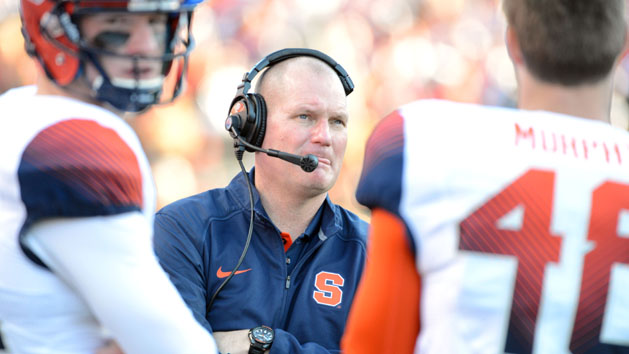 Nov 21, 2015; Raleigh, NC, USA; Syracuse Orange head coach Scott Shafer (center) watches a replay during the second half against the North Carolina State Wolfpack at Carter Finley Stadium. North Carolina State won 42-29. Mandatory Credit: Rob Kinnan-USA TODAY Sports