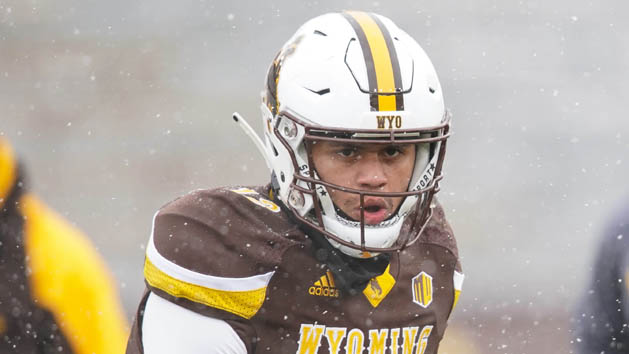 Nov 17, 2018; Laramie, WY, USA; Wyoming Cowboys quarterback Sean Chambers (12) warms up before game against the Air Force Falcons at Jonah Field War Memorial Stadium. Photo Credit: Troy Babbitt-USA TODAY Sports