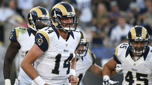 Aug 13, 2016; Los Angeles, CA, USA; Los Angeles Rams quarterback Sean Mannion (14) reacts after Los Angeles Rams running back Chase Reynolds (not pictured) scored a touchdown against the Dallas Cowboys during the third quarter at Los Angeles Memorial Coliseum. Photo Credit: Richard Mackson-USA TODAY Sports