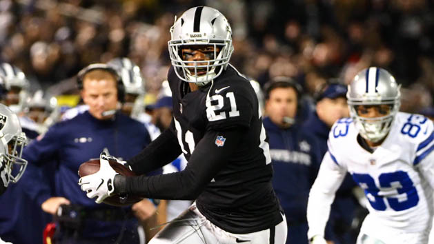 Dec 17, 2017; Oakland, CA, USA; Oakland Raiders cornerback Sean Smith (21) runs an interception against the Dallas Cowboys during the third quarter at Oakland Coliseum. Photo Credit: Kelley L Cox-USA TODAY Sports