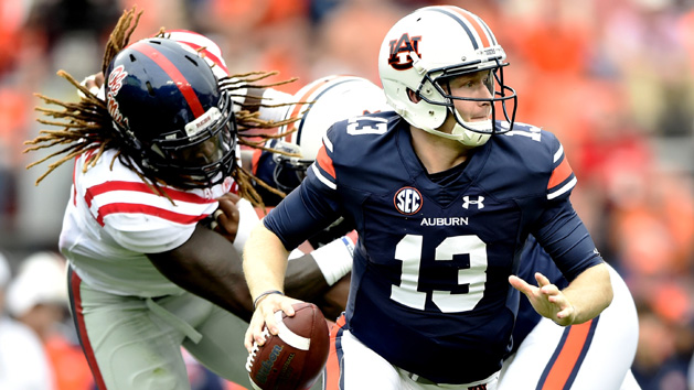 Sean White (13) looks for a receiver against the Ole Miss Rebels at Jordan Hare Stadium. Photo Credit: Garrett Reid-USA TODAY Sports