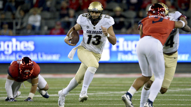 Nov 12, 2016; Tucson, AZ, USA; Colorado Buffaloes quarterback Sefo Liufau (13) runs the ball during the second quarter against the Arizona Wildcats at Arizona Stadium. Photo Credit: Casey Sapio-USA TODAY Sports