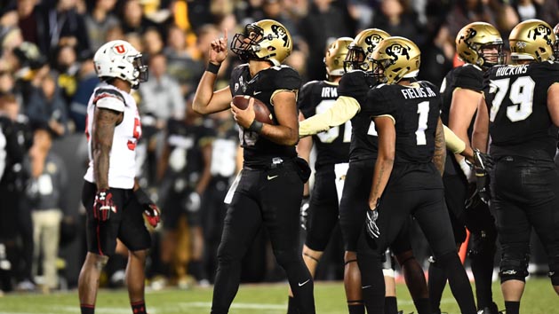 Nov 26, 2016; Boulder, CO, USA; Colorado Buffaloes quarterback Sefo Liufau (13) signals upwards as time expires in the fourth quarter against the Utah Utes at Folsom Field. The Buffaloes defeated the Utes 27-22. Photo Credit: Ron Chenoy-USA TODAY Sports