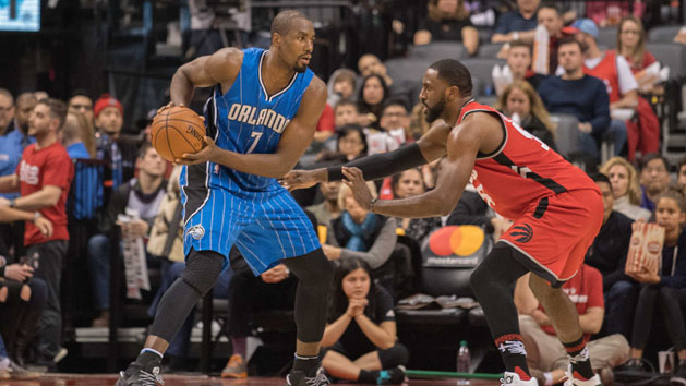 Jan 29, 2017; Toronto, Ontario, CAN; Orlando Magic forward Serge Ibaka (7) controls a ball as Toronto Raptors forward Patrick Patterson (54) defends during the third quarter in a game at Air Canada Centre. The Orlando Magic won 114-113. Photo Credit: Nick Turchiaro-USA TODAY Sports