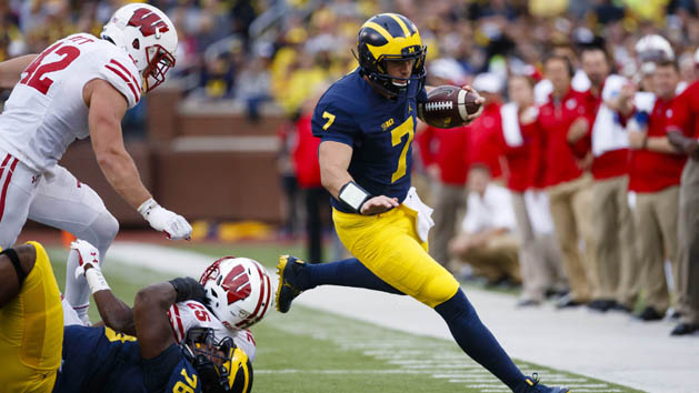 Oct 1, 2016; Ann Arbor, MI, USA; Michigan Wolverines quarterback Shane Morris (7) rushes in the third quarter against the Wisconsin Badgers at Michigan Stadium. Michigan won 14-7. Photo Credit: Rick Osentoski-USA TODAY Sports