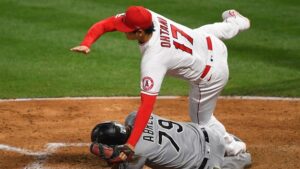 Ohtani’s flashy two-way debut ends with collision