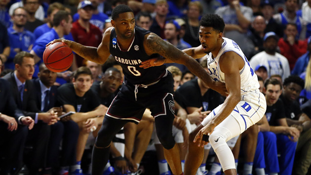 Mar 19, 2017; Greenville, SC, USA; South Carolina Gamecocks guard Sindarius Thornwell (0) handles the ball against Duke Blue Devils guard Matt Jones (13) during the first half in the second round of the 2017 NCAA Tournament at Bon Secours Wellness Arena. Photo Credit: Jeremy Brevard-USA TODAY Sports