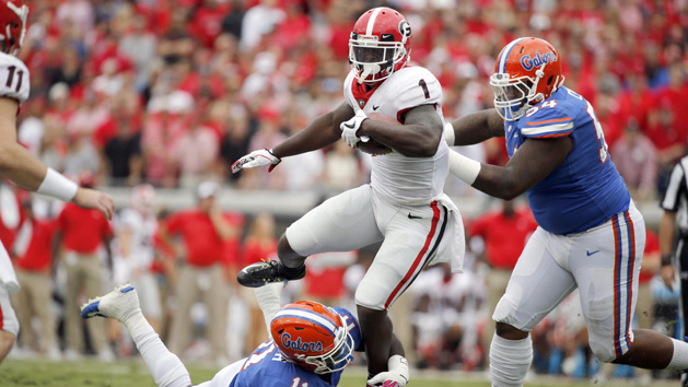 Oct 28, 2017; Jacksonville, FL, USA; Florida Gators linebacker Vosean Joseph (11) and Florida Gators defensive lineman Khairi Clark (54) tackle Georgia Bulldogs running back Sony Michel (1) during the first quarter at EverBank Field. Photo Credit: Kim Klement-USA TODAY Sports