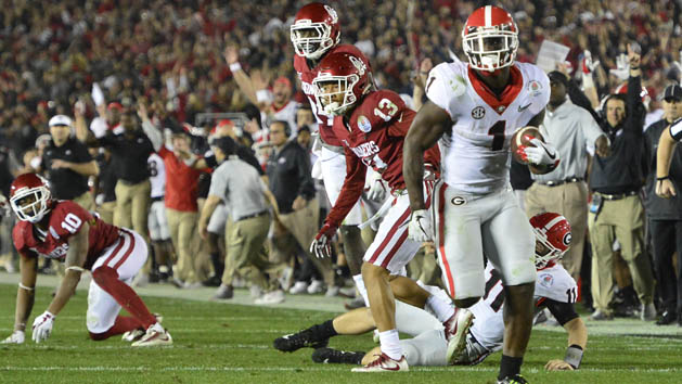 January 1, 2018; Pasadena, CA, USA; Georgia Bulldogs running back Sony Michel (1) runs the ball for the winning touchdown during the overtime period in the 2018 Rose Bowl college football playoff semifinal game at Rose Bowl Stadium. Photo Credit: Gary A. Vasquez-USA TODAY Sports