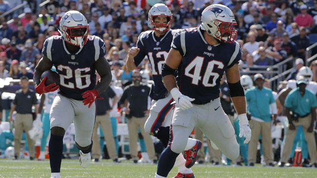 Sep 30, 2018; Foxborough, MA, USA; New England Patriots running back Sony Michel (26) runs the ball against the Miami Dolphins in the first half at Gillette Stadium. Photo Credit: David Butler II-USA TODAY Sports