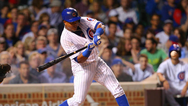 Sep 27, 2015; Chicago, IL, USA; Chicago Cubs shortstop Starlin Castro (13) hits a two RBI double during the seventh inning against the Pittsburgh Pirates at Wrigley Field. Mandatory Credit: Dennis Wierzbicki-USA TODAY Sports