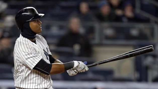 Apr 6, 2016; Bronx, NY, USA; New York Yankees shortstop Starlin Castro (14) hits a three-run home run against the Houston Astros during the second inning at Yankee Stadium. Mandatory Credit: Adam Hunger-USA TODAY Sports