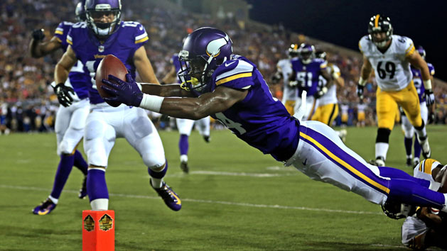 Aug 9, 2015; Canton, OH, USA; Minnesota Vikings wide receiver Stefon Diggs (14) dives for the end zone during the third quarter against the Pittsburgh Steelers at Tom Benson Hall of Fame Stadium. Photo Credit: Andrew Weber-USA TODAY Sports