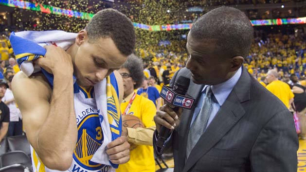May 18, 2016; Oakland, CA, USA; Golden State Warriors guard Stephen Curry (30) looks at his bruise while being interviewed by TNT reporter David Aldridge (right) after game two of the Western conference finals of the NBA Playoffs against the Oklahoma City Thunder at Oracle Arena. The Warriors defeated the Thunder 118-91. Mandatory Credit: Kyle Terada-USA TODAY Sports