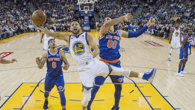 January 23, 2018; Oakland, CA, USA; Golden State Warriors guard Stephen Curry (30) shoots the basketball against New York Knicks center Enes Kanter (00) during the second half at Oracle Arena. The Warriors defeated the Knicks 123-112. Photo Credit: Kyle Terada-USA TODAY Sports