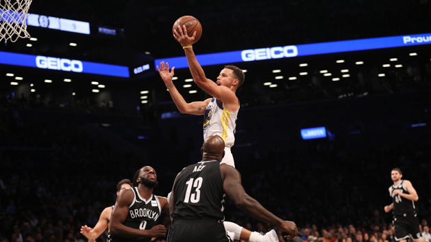Nov 19, 2017; Brooklyn, NY, USA; Golden State Warriors guard Stephen Curry (30) drives over the Brooklyn Nets defense during the first quarter at Barclays Center. Photo Credit: Anthony Gruppuso-USA TODAY Sports