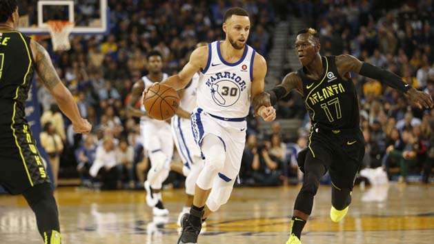 Mar 23, 2018; Oakland, CA, USA; Golden State Warriors guard Stephen Curry (30) dribbles past Atlanta Hawks guard Dennis Schroder (17) in the first quarter at Oracle Arena. Photo Credit: Cary Edmondson-USA TODAY Sports