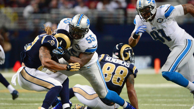 Dec 13, 2015; St. Louis, MO, USA; Detroit Lions middle linebacker Stephen Tulloch (55) tackles St. Louis Rams running back Tre Mason (27) during the second half at the Edward Jones Dome. The Rams defeated the Lions 21-14. Mandatory Credit: Jeff Curry-USA TODAY Sports