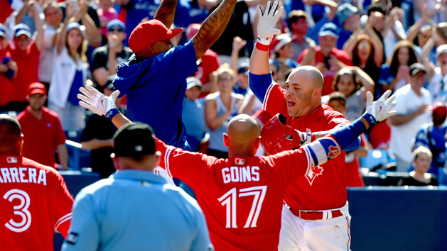 Jul 30, 2017; Toronto, Ontario, CAN; Toronto Blue Jays left fielder Steve Pearce (28) celebrates with teammates at home plate after hitting a walk off grand slam home run against Los Angeles Angels in the ninth inning at Rogers Centre. Photo Credit: Dan Hamilton-USA TODAY Sports