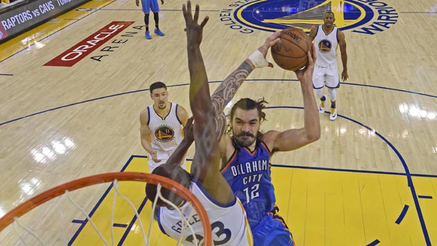 May 16, 2016; Oakland, CA, USA; Oklahoma City Thunder center Steven Adams (12) goes up for a dunk against Golden State Warriors forward Draymond Green (23) in the fourth quarter in game one of the Western conference finals of the NBA Playoffs at Oracle Arena. The Thunder defeated the Warriors 108-102. Photo Credit: Jose Carlos Fajardo-Pool Photo via USA TODAY Sports