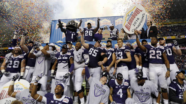Jan 2, 2016; San Antonio, TX, USA; TCU Horned Frogs players celebrate their 47-41 victory over the Oregon Ducks at the 2016 Alamo Bowl in the Alamodome. Mandatory Credit: Erich Schlegel-USA TODAY Sports