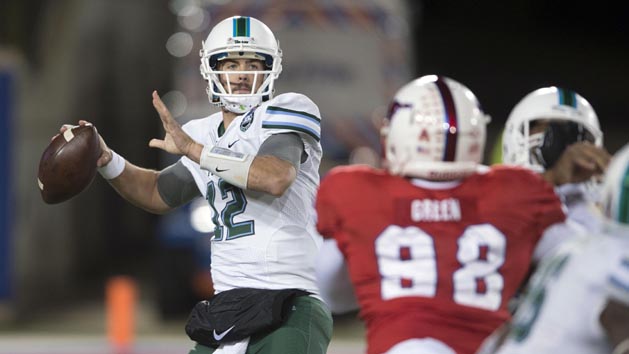 Nov 21, 2015; Dallas, TX, USA; Tulane Green Wave quarterback Tanner Lee (12) drops back to pass against the Southern Methodist Mustangs during the second quarter at Gerald J. Ford Stadium. Photo Credit: Jerome Miron-USA TODAY Sports