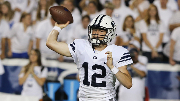 Sep 12, 2015; Provo, UT, USA; Brigham Young Cougars quarterback Tanner Mangum (12) throws the ball against the Boise State Broncos in the third quarter at Lavell Edwards Stadium. Brigham Young Cougars won the game 35-24. Mandatory Credit: Chris Nicoll-USA TODAY Sports