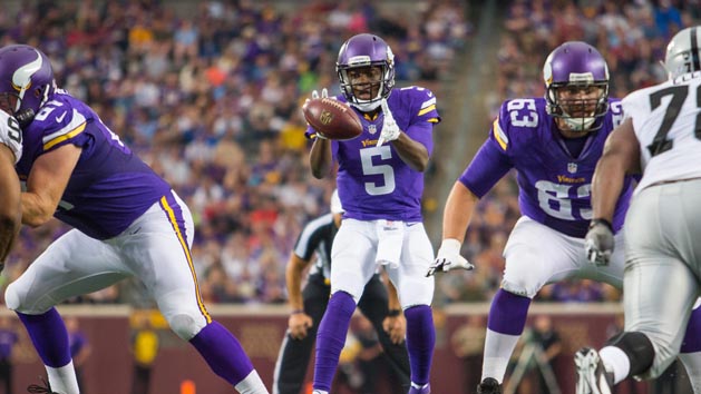 Aug 22, 2015; Minneapolis, MN, USA; Minnesota Vikings quarterback Teddy Bridgewater (5) takes the snap in the second quarter against the Oakland Raiders at TCF Bank Stadium. Photo Credit: Brad Rempel-USA TODAY Sports