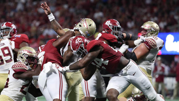 Sep 2, 2017; Atlanta, GA, USA; Alabama Crimson Tide defensive lineman Da'Shawn Hand (9) and linebacker Terrell Lewis (24) hit Florida State Seminoles quarterback Deondre Francois (12) in the fourth quater at Mercedes-Benz Stadium. Photo Credit: Jason Getz-USA TODAY Sports