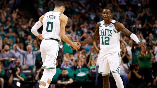 May 23, 2018; Boston, MA, USA; Boston Celtics forward Jayson Tatum (0) and Boston Celtics guard Terry Rozier (12) high-five after a score during the third quarter against the Cleveland Cavaliers in game five of the Eastern conference finals of the 2018 NBA Playoffs at TD Garden. Photo Credit: Greg M. Cooper-USA TODAY Sports