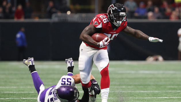 Dec 3, 2017; Atlanta, GA, USA; Atlanta Falcons running back Tevin Coleman (26) carries the ball as Minnesota Vikings linebacker Anthony Barr (55) tackles in the first quarter against the Minnesota Vikings at Mercedes-Benz Stadium. Photo Credit: Jason Getz-USA TODAY Sports