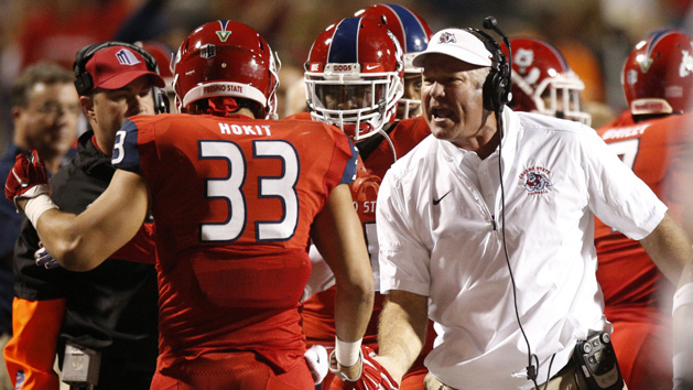Oct 14, 2016; Fresno, CA, USA; Fresno State Bulldogs head coach Tim DeRuyter congratulates linebacker Josh Hokit (33) after the Bulldogs stopped the San Diego State Aztecs on fourth down in the first quarter at Bulldog Stadium. Photo Credit: Cary Edmondson-USA TODAY Sports