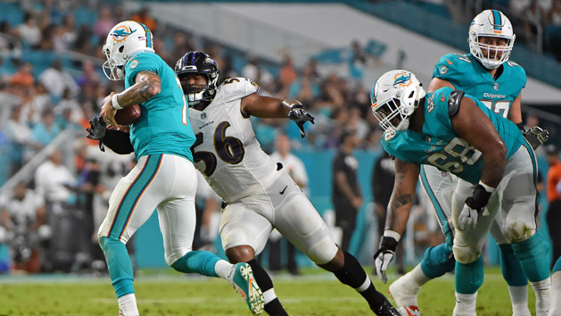 Aug 17, 2017; Miami Gardens, FL, USA; Baltimore Ravens outside linebacker Tim Williams (56) sacks Miami Dolphins quarterback Brandon Doughty (7) during the second half at Hard Rock Stadium. Photo Credit: Jasen Vinlove-USA TODAY Sports