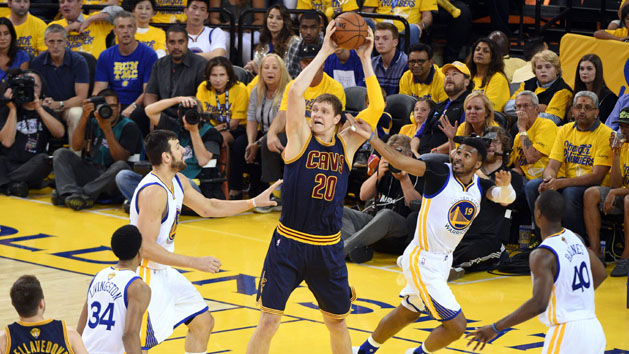Jun 5, 2016; Oakland, CA, USA; Cleveland Cavaliers center Timofey Mozgov (20) grabs a rebound against Golden State Warriors guard Leandro Barbosa (19) during the fourth quarter in game two of the NBA Finals at Oracle Arena. Photo Credit: Kyle Terada-USA TODAY Sports