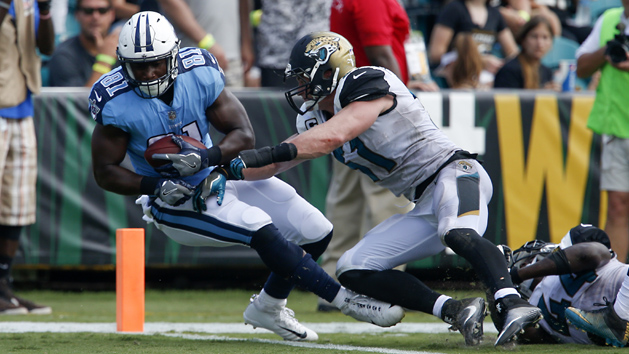 Sep 17, 2017; Jacksonville, FL, USA; Tennessee Titans tight end Jonnu Smith (81) dives into the end zone for a touchdown in front of Jacksonville Jaguars middle linebacker Paul Posluszny (51) during the second half of a football game at EverBank Field. Photo Credit: Reinhold Matay-USA TODAY Sports