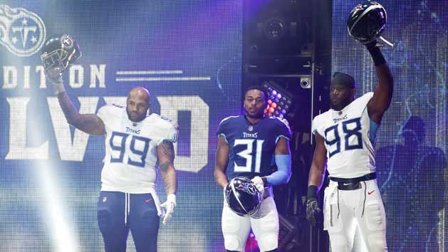 Apr 3, 2018; Nashville, TN, USA; Tennessee Titans defensive tackle Jurrell Casey (99), safety Kevin Byard (31), linebacker Brian Orakpo (98), show off their new uniforms during the Titans uniform reveal event held at Broadway and 1st Avenue. Photo Credit: Andrew Nelles / The Tennessean Appeal via USA TODAY NETWORK