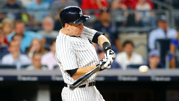 Aug 11, 2017; Bronx, NY, USA; New York Yankees third baseman Todd Frazier (29) hits an RBI single against the Boston Red Sox during the eighth inning at Yankee Stadium. Photo Credit: Andy Marlin-USA TODAY Sports