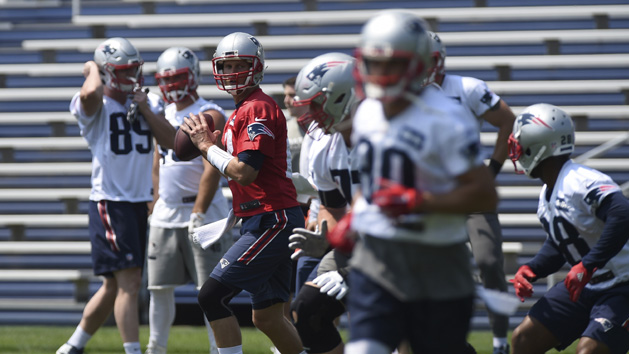 Jun 13, 2017; Foxborough, MA, USA; New England Patriots quarterback Tom Brady (12) sets to throw a pass during minicamp at Gillette Stadium practice field. Photo Credit: Bob DeChiara-USA TODAY Sports