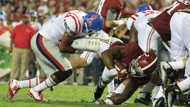 Sep 19, 2015; Tuscaloosa, AL, USA; Alabama Crimson Tide running back Derrick Henry (2) is hit by Mississippi Rebels defensive back Tony Conner (12)at Bryant-Denny Stadium. Mandatory Credit: Marvin Gentry-USA TODAY Sports