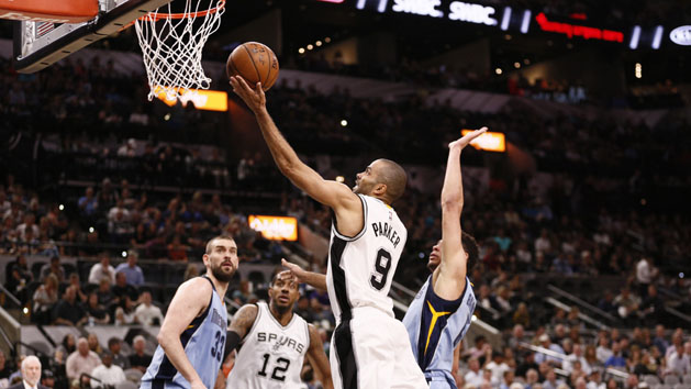 Apr 4, 2017; San Antonio, TX, USA; San Antonio Spurs point guard Tony Parker (9) drives to the basket as Memphis Grizzlies point guard Wade Baldwin IV (4) defends during the first half at AT&T Center. Photo Credit: Soobum Im-USA TODAY Sports