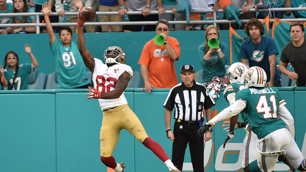 Nov 27, 2016; Miami Gardens, FL, USA; San Francisco 49ers wide receiver Torrey Smith (82) makes a one handed catch for a touchdown in front of Miami Dolphins cornerback Byron Maxwell (41) during the second half at Hard Rock Stadium. The Dolphins won 31-24. Photo Credit: Steve Mitchell-USA TODAY Sports
