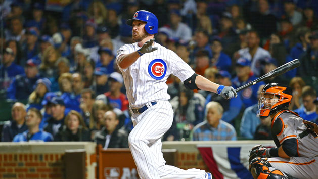 Oct 8, 2016; Chicago, IL, USA; Chicago Cubs relief pitcher Travis Wood (37) hits a home run against the San Francisco Giants during the fourth inning during game two of the 2016 NLDS playoff baseball series at Wrigley Field. Photo Credit: Jerry Lai-USA TODAY Sports