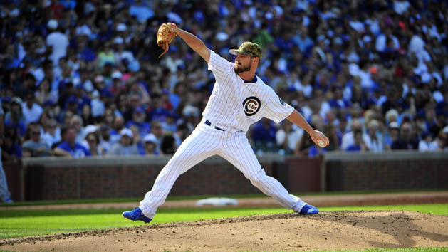 May 30, 2016; Chicago, IL, USA; Chicago Cubs relief pitcher Travis Wood (37) throws the ball against the Los Angeles Dodgers during the third inning at Wrigley Field. Mandatory Credit: David Banks-USA TODAY Sports