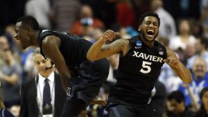 Zags hold off WVU; Xavier upsets Arizona